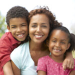 Mother With Children In Park
