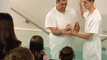 man being baptized